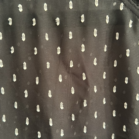 Sheer black Loft blouse with silver ribbon accents. - Picture 3 of 6